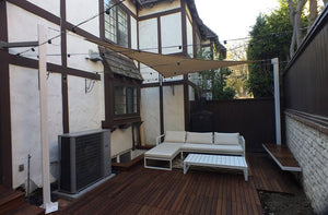 Small Sail Shade Structure in Backyard